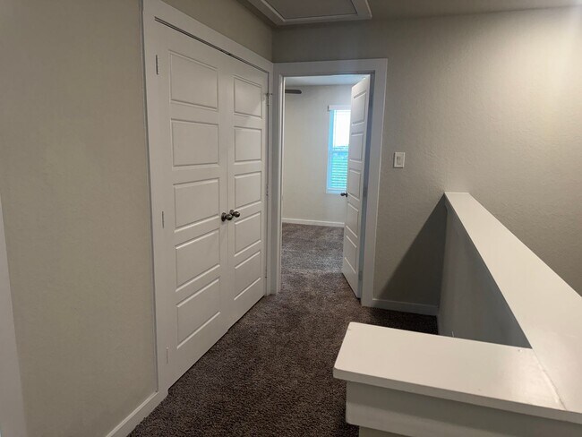 Building Photo - Stylish, Spacious & Close to It All – Your Ideal Townhome Awaits!