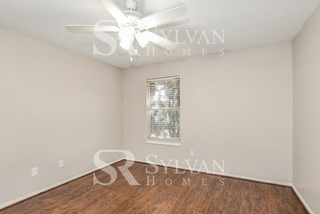 Building Photo - The living is easy in this gorgeous 4BR, 2.5BA brick home