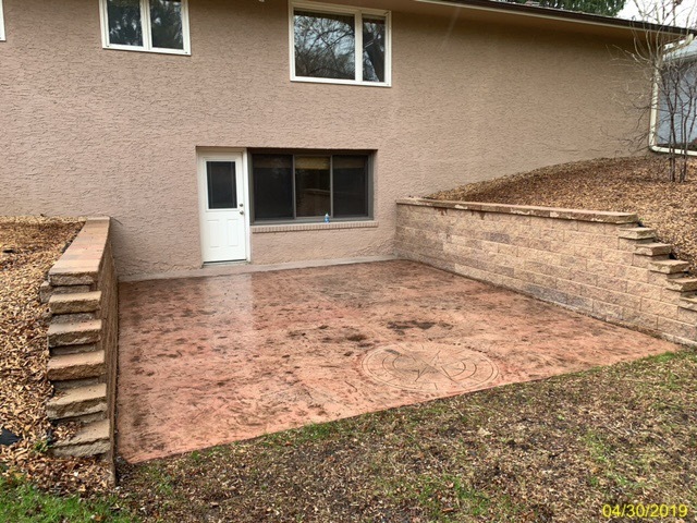 Stamped back patio - 930 W County Rd D