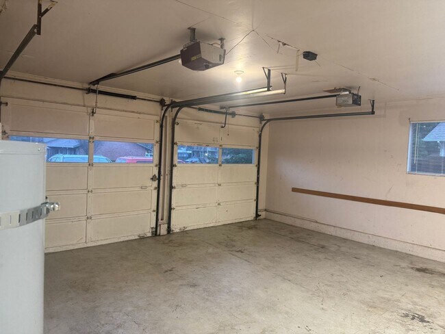 Building Photo - Charming 3 Bedroom with a Living Room, Sun Room,Huge Fenced Yard & More!