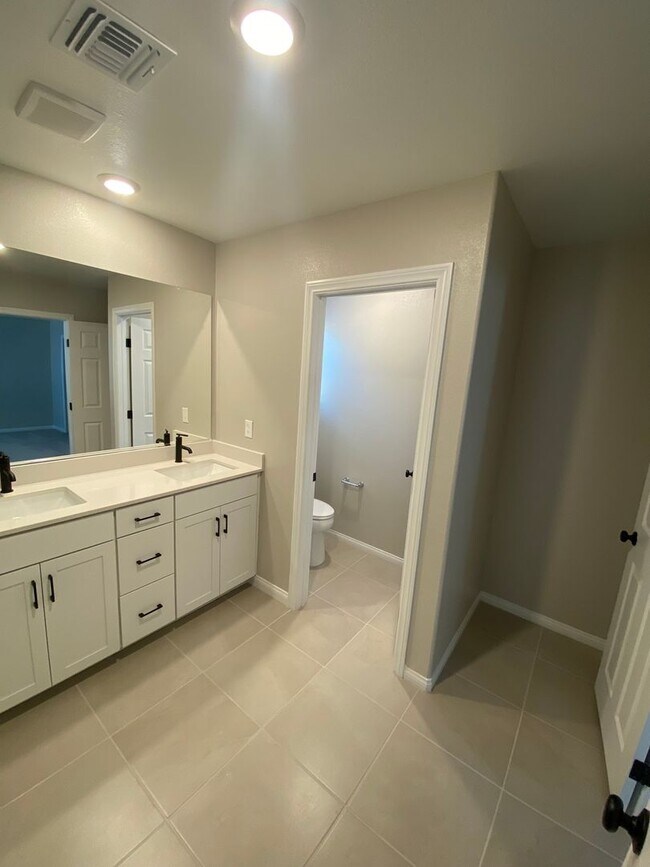 Building Photo - Americana Property Mgmt - 2022 built 4 bedrooms in prime South West Las Vegas