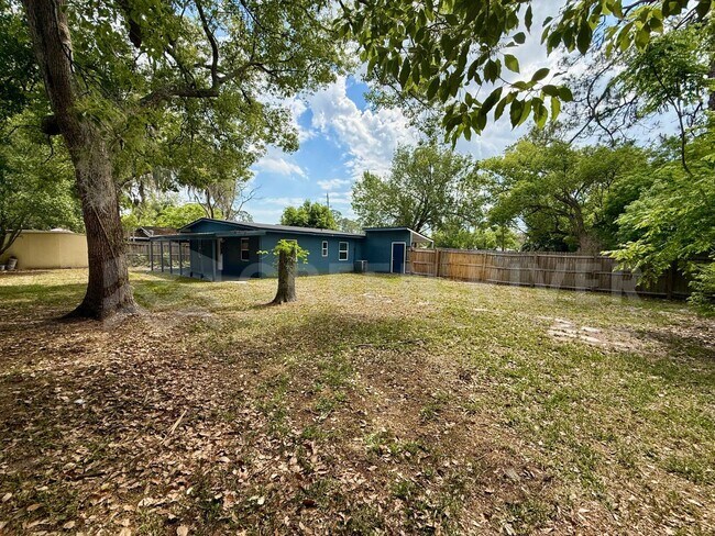 Building Photo - Fully Renovated 2BR Brick Home with Vaulted Ceilings & Backyard Retreat!