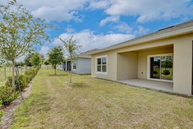 Building Photo - Move-In Ready 2BR/2BA Villa with Den + 2-Car Garage | Lake Nona Adjacent | Suncrest at St. Cloud