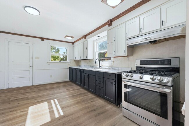 Building Photo - NEW 4-Bed Home with Modern Updates & Extra...