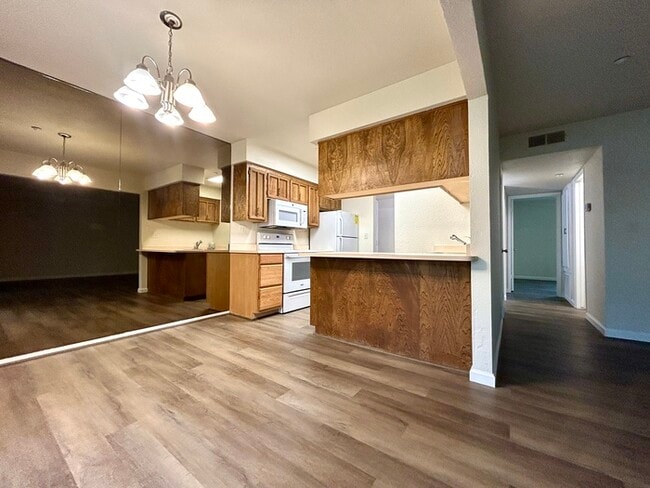 Building Photo - Beautiful Downstairs 2 Bedroom Condo Located In Gated Community Pool + Lake Access!