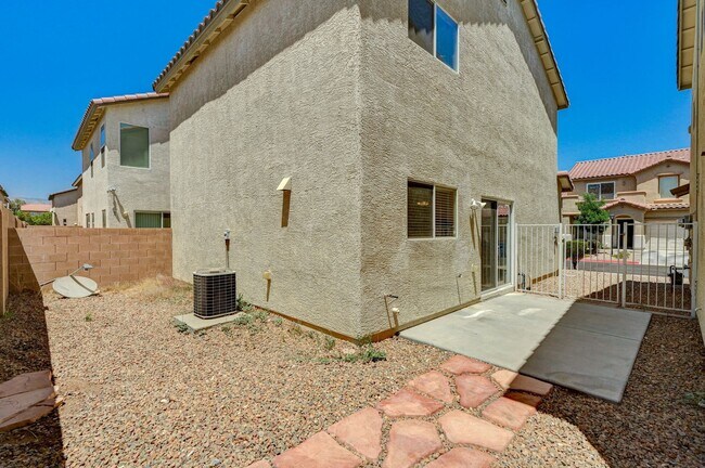 Building Photo - Quaint two-story home in a gated Las Vegas...