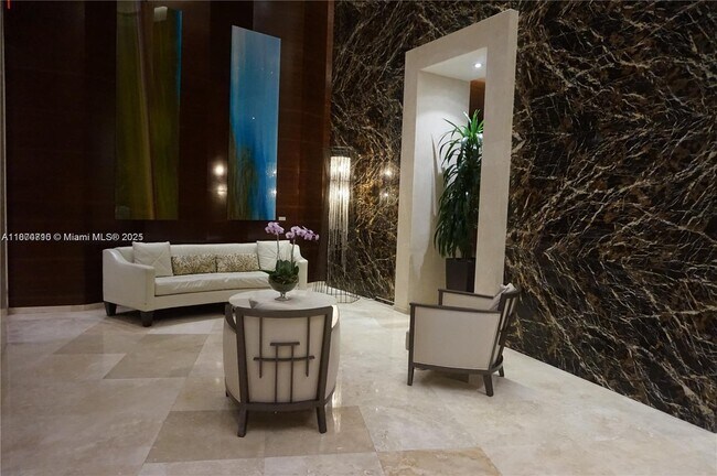 Building Photo - 15811 Collins Ave
