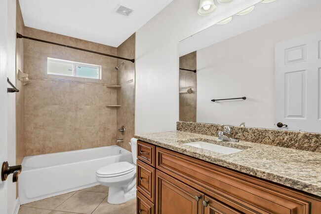 Building Photo - Beach living at it's finest! This 3 bedroo...