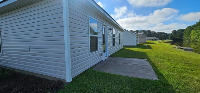 Building Photo - Brand-New Smart Home in the Gated Sandpipe...