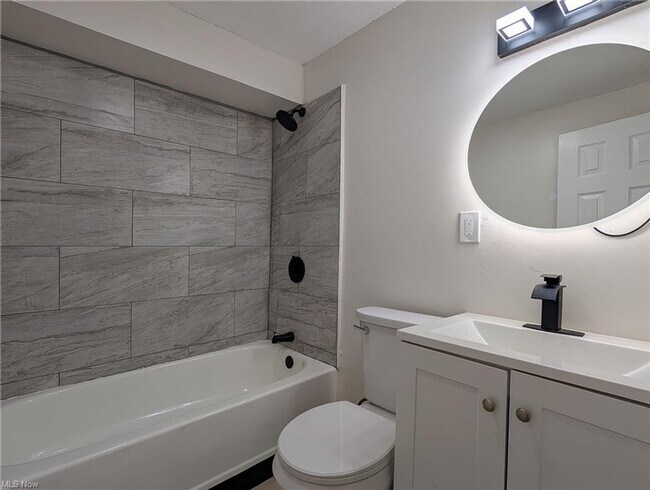 Building Photo - A Fresh Start on a Quiet Street – Everything new for you plus half off first months rent is waiting!