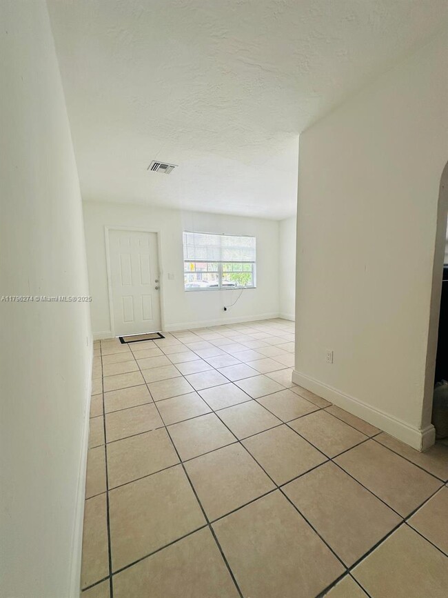 Building Photo - 115 NW 56th Ave.