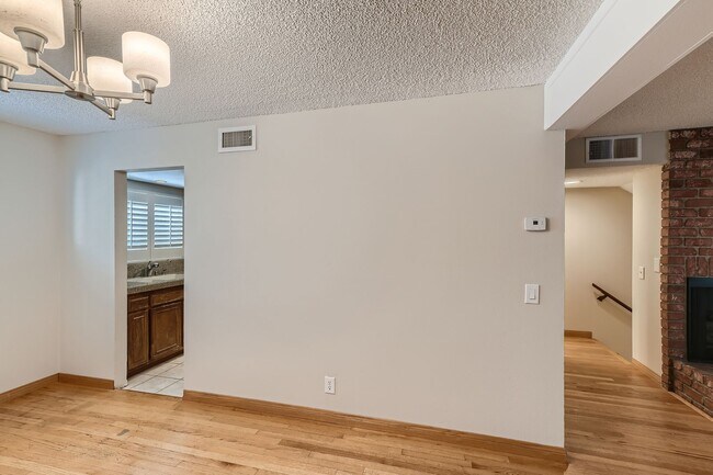 Building Photo - Freshly Updated 2-Bedroom Condo with Attached Garage in Gated Winnetka Community