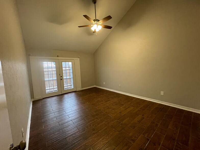 french doors leading out to patio off primary bedroom - 812 Via Madonna
