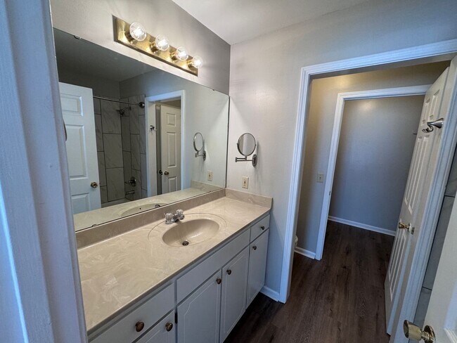 Building Photo - Quiet 3/2 Home with attached garage and fenced yard