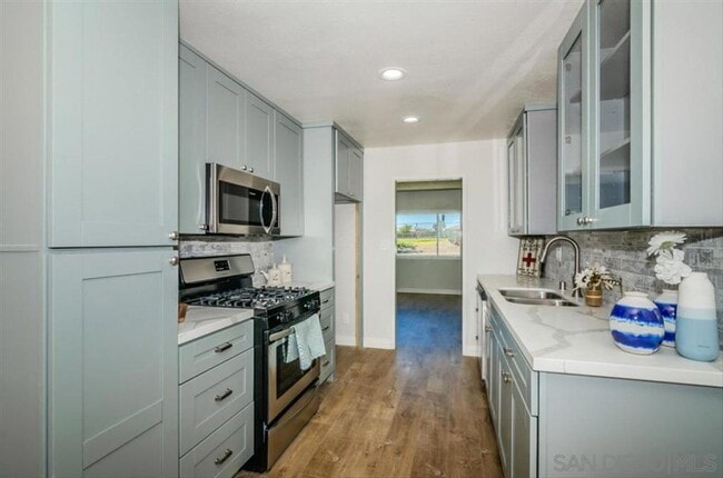 Building Photo - Remodeled 3 bedroom 2 bath.  Fenced yard. Outdoor shower, deck ,attached garage. Near beaches.