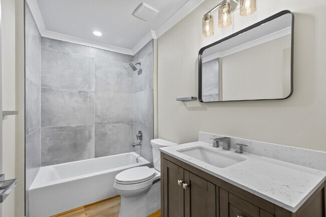 Building Photo - Modern Living Awaits!