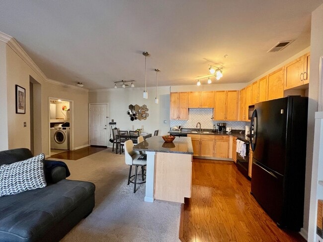 Building Photo - Available April 15th 2BD/2BA Condo on Granby! Gated Garage Parking with 2 Reserved Spots!! Balcony!