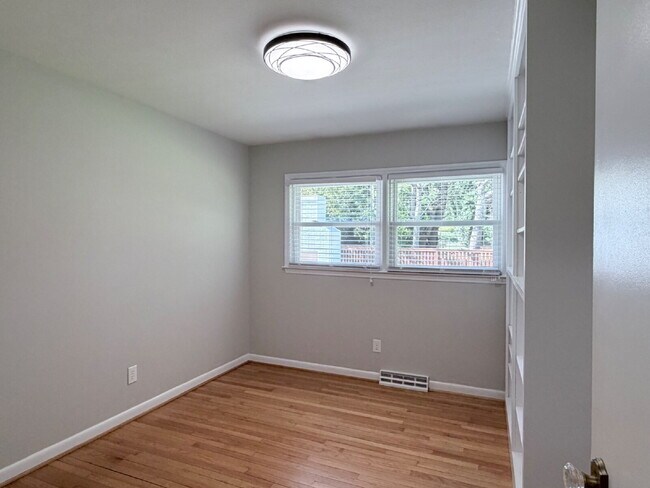 Building Photo - Updated 3BR Home in Beaver Lake | Fenced Yard, Garage, Covered Porch & Outdoor Fireplace | Pet Fr...
