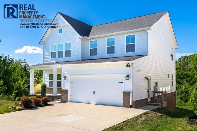 Building Photo - Great 4 bd 2.5 ba with attached garage and large deck!