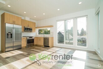 Building Photo - Modern Comfort Meets Elevated Style in Pri...