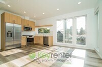 Building Photo - Skyline Chic: Modern Living with a Rooftop...