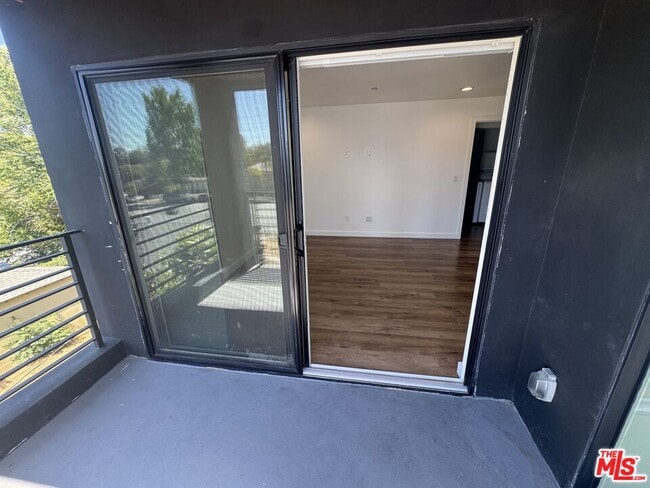 Building Photo - 5638 Woodman Ave
