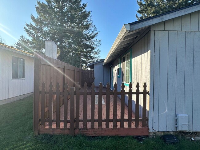 Building Photo - Spacious & Stylish 3BD Home with Iconic Stone Fireplace + Soaking Tub