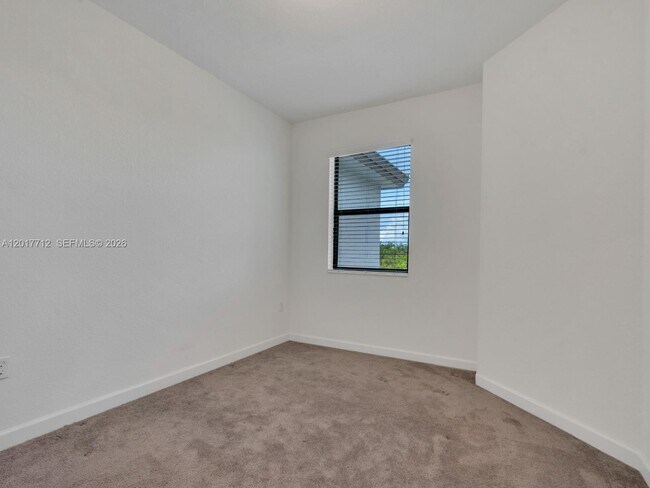 Building Photo - 25036 SW 107th Ave