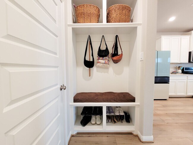 Building Photo - A true gem on a quiet corner lot, this spacious and sun-filled home is tucked away from street no...