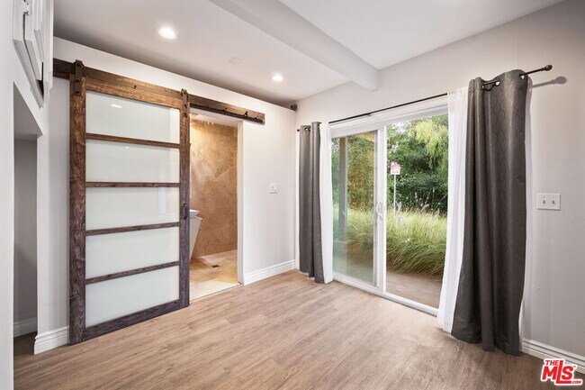 Building Photo - 8657 Valley Flores Dr