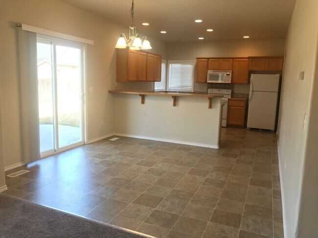 Building Photo - Meridian Charmer with 3 Car Garage, & Huge Backyard!