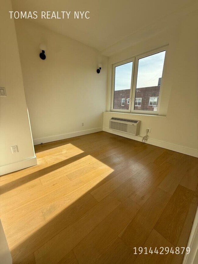 Building Photo - 3103 Sedgwick Ave