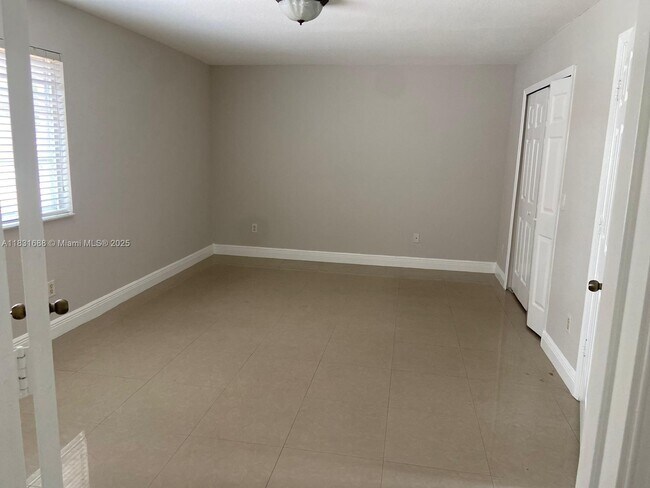 Building Photo - 7289 NW 173rd Dr