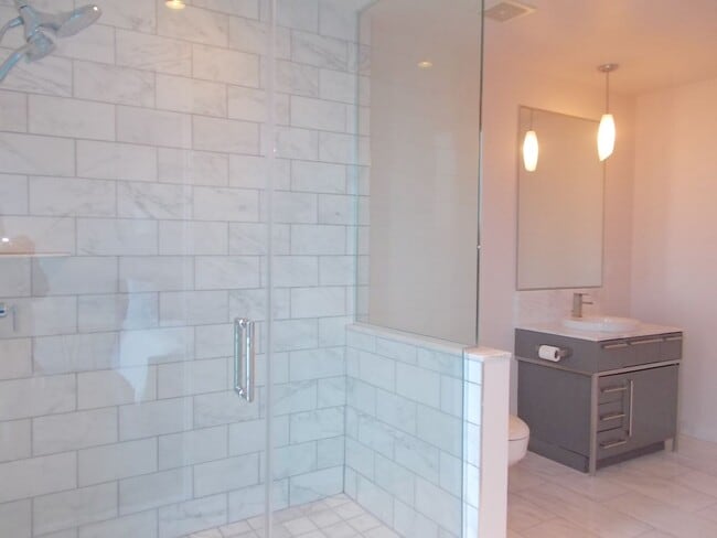 Building Photo - Experience elevated high-rise living at The Martin.