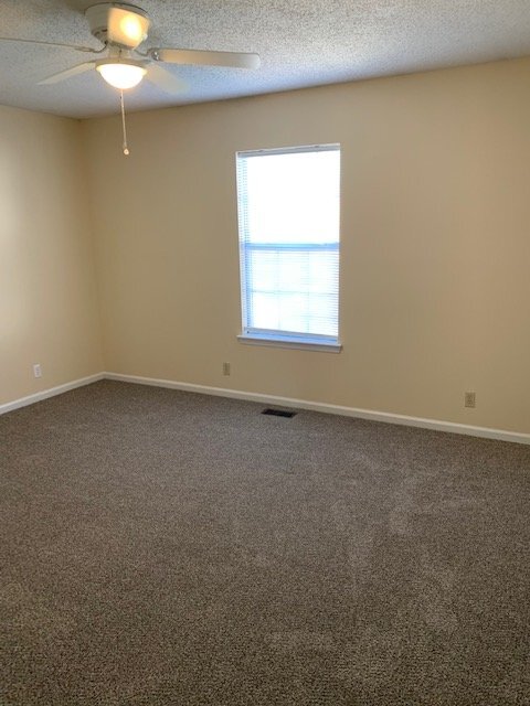 Building Photo - "Charming 2-Bedroom Duplex Retreat with 2.5 Baths in Greenville – Your 1116 Sq. Ft. Sanctuary Awa...