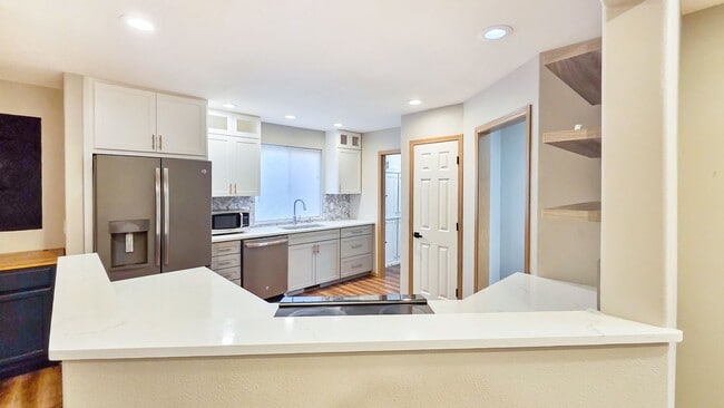 Building Photo - Updated 4-Bed Home Near Future Light Rail ...