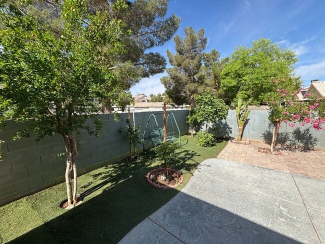 Building Photo - This inviting single-story home boasts a s...