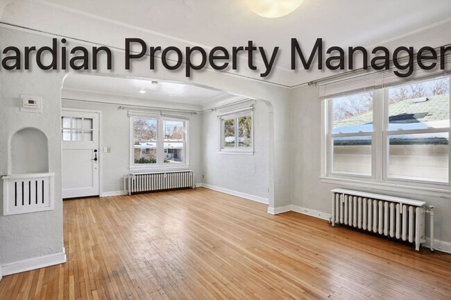 Building Photo - Linden Hills Side By Side, Hardwood Floors, Attached Garage, New Efficient Heating System, Pets W...