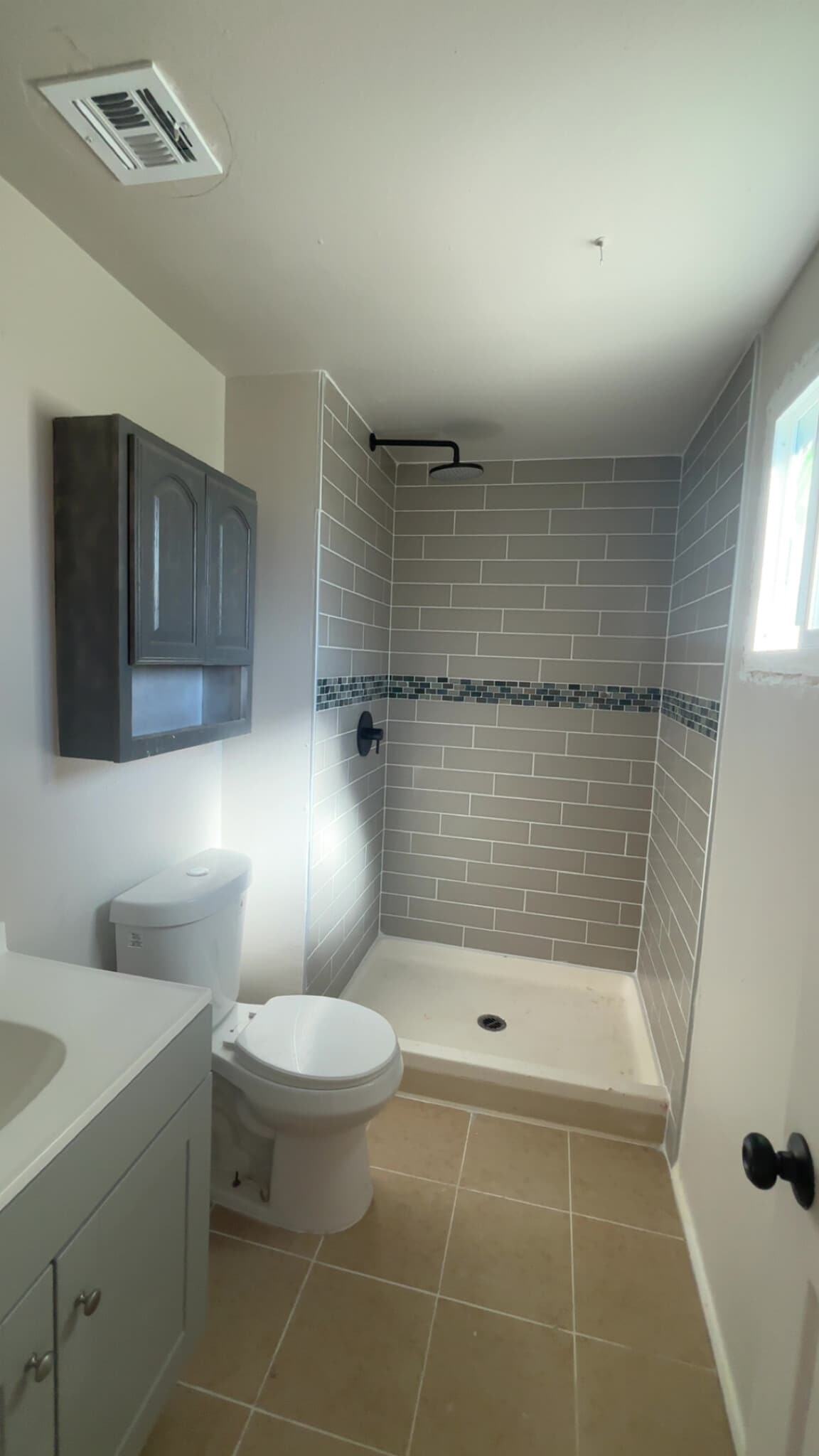 Brand new tile toilet vanity and lighting - 7261 W Camelback Rd
