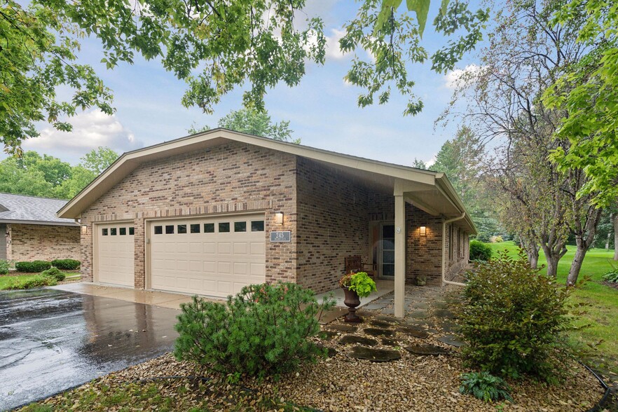 Heated 3 car garage with epoxied flooring - 245 Inland Ln N