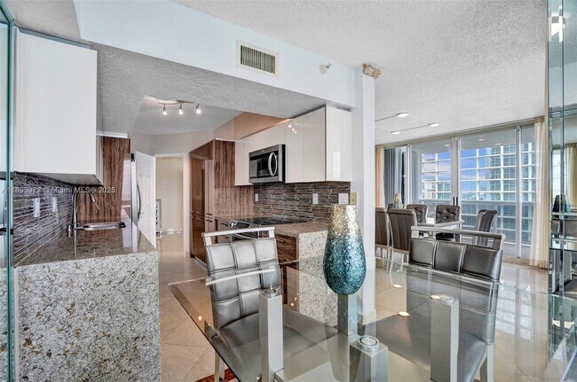 Building Photo - 16711 Collins Ave