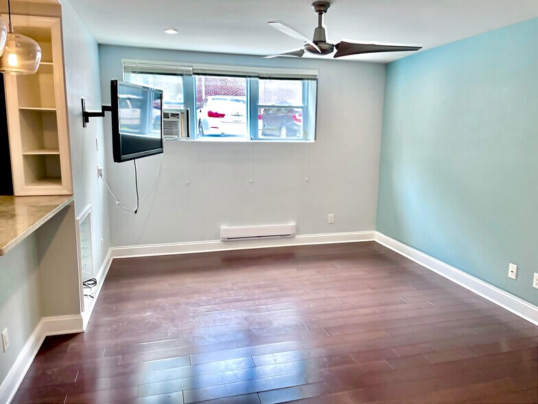 Living room, wall-mounted TV included - 2339 40th Pl NW