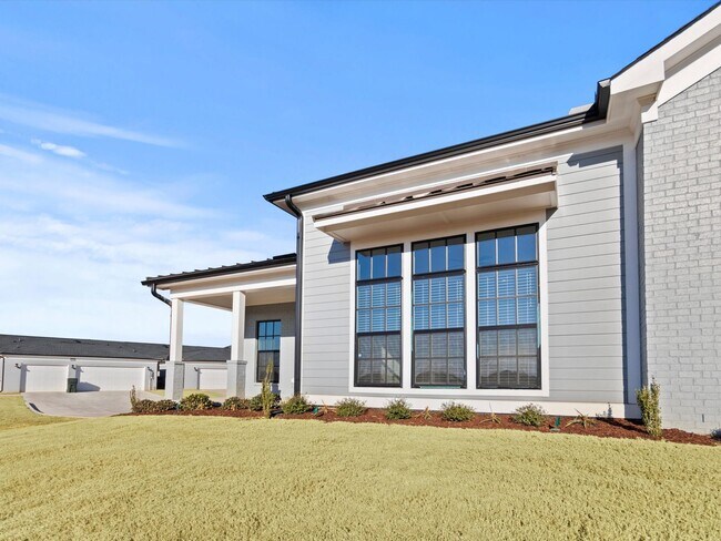 Building Photo - 3 Car Garage! Modern end-unit townhome located in the desirable Clift Farm!