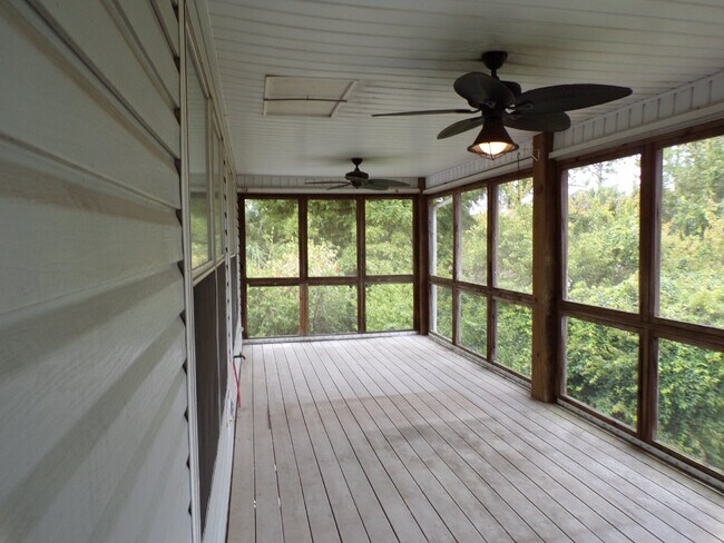 Building Photo - Live the Gulf Breeze Waterfront Life – Dock, Canal Access & Boat Lift!