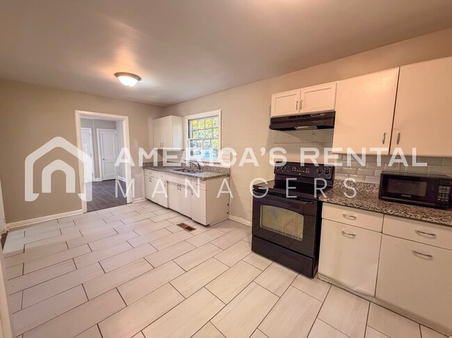 Building Photo - Coming Soon! View NOW! Cozy Anniston Home ...