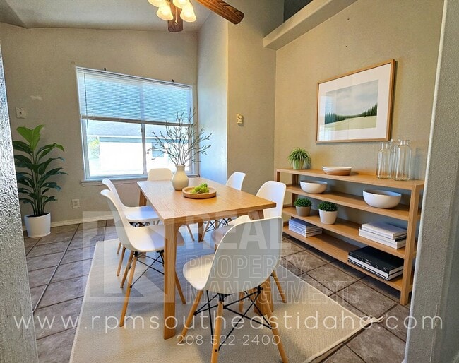 Building Photo - Spacious & Updated 2 Bedroom, 2 Bathroom Twin Home in Ammon with Garage, Fenced Backyard, and Hoo...