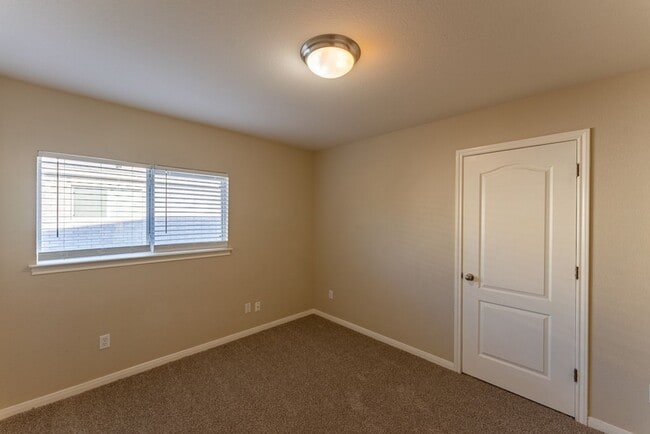 Building Photo - Charming Brick Home with Open Floorplan, Vaulted Ceilings, and Luxurious Amenities—Perfect for An...