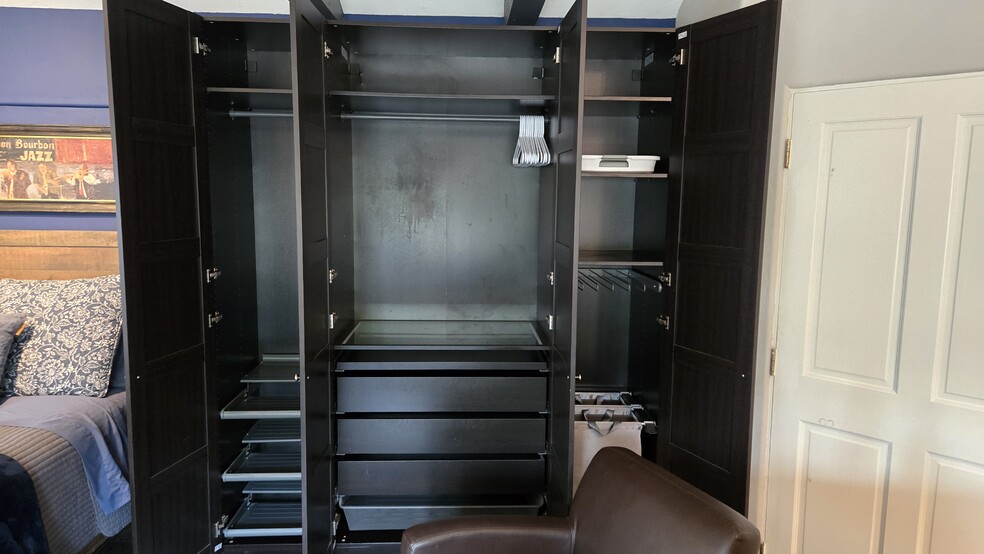 Spacious wardrobe cabinets - 10224 Aviary Dr