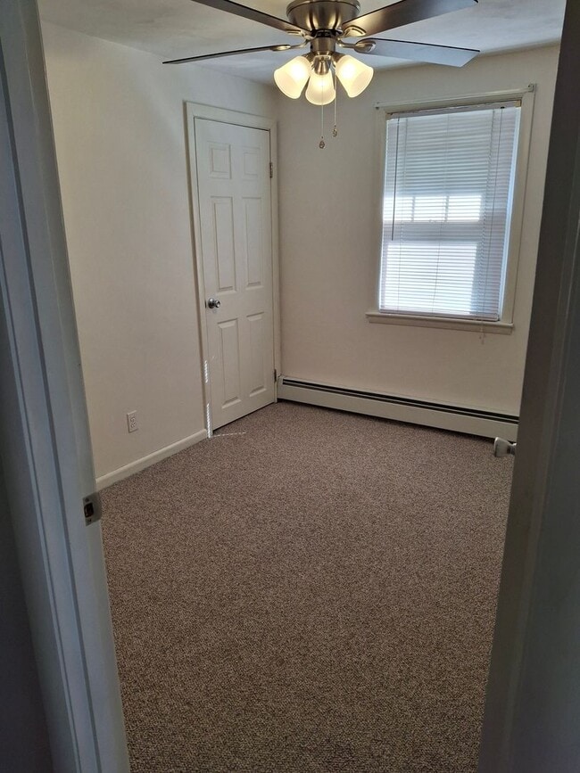 Building Photo - Charming 3-Bedroom Home with Backyard & Of...