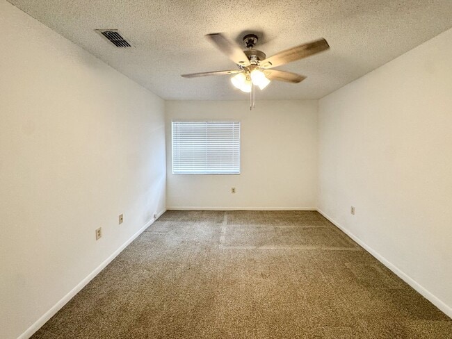 Building Photo - Tamarind - Renovated 2 Bedroom 2 Bath Condominium